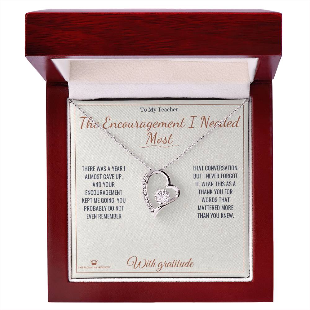 Close-up detail of the forever love necklace for teacher