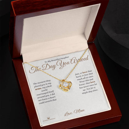 Close-up detail of the love knot necklace for daughter
