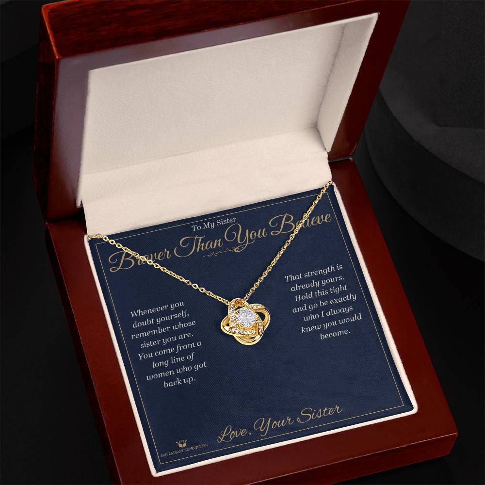 Close-up detail of the love knot necklace for sister