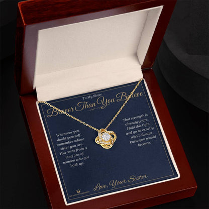 Close-up detail of the love knot necklace for sister