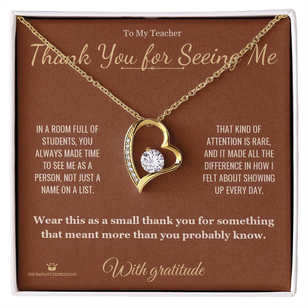 Close-up detail of the forever love necklace for teacher